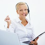lady on a headset with an ipad tablet